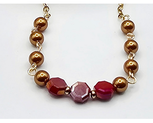 3 richly colored maroon faceted coin beads with gold swarovski pearls on gold chain
